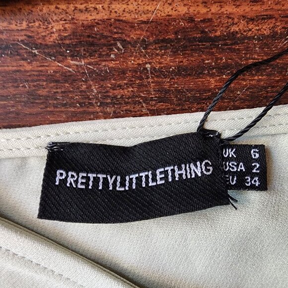 NWT PrettyLittleThing Sage Green Twist Front Split Leg Mini Skirt Size 6 - Picture 8 of 12